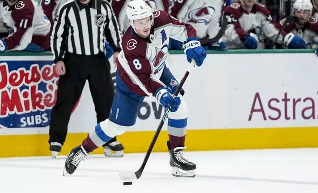 Colorado Avalanche defenseman Cale Makar passes the puck against the Dallas Stars during the second period in Game 5 of an NHL hockey Stanley Cup second-round playoff series, Wednesday, May 15, 2024, in Dallas. (AP Photo/Tony Gutierrez)