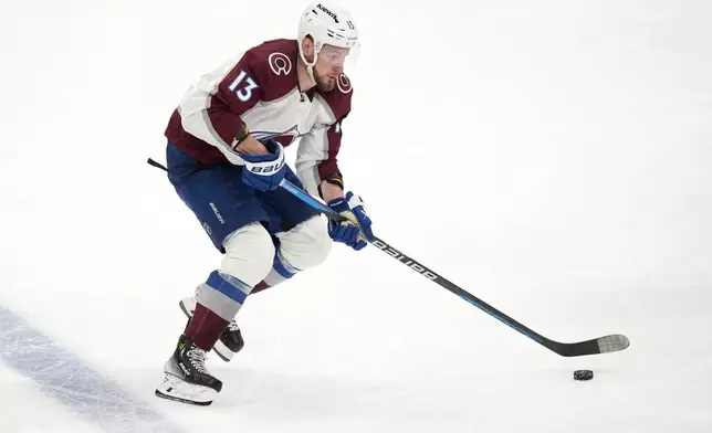 Colorado Avalanche right wing Valeri Nichushkin controls the puck in the third period in Game 2 of an NHL hockey Stanley Cup second-round playoff series against the Dallas Stars in Dallas, Tuesday, May 7, 2024. (AP Photo/LM Otero)