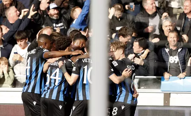 Players celebrate after Brugge's Maxim De Cuyper scored the opening goal during the Europa Conference League semi-final second leg soccer match between Club Brugge and Fiorentina at the Jan Breydel Stadium in Bruges, Belgium, Wednesday, May 8, 2024. (AP Photo/Omar Havana)