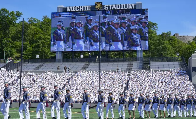Graduating cadets arriving at the commencement ceremonies at the U.S. Military Academy ahead of President Joe Biden's arrival, Saturday, May 25, 2024, in West Point, N.Y. (AP Photo/Alex Brandon)