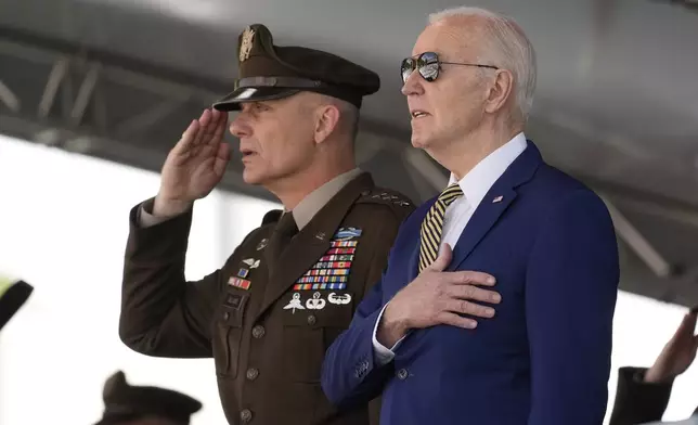 President Joe Biden, right, and Lt. General Steven W. Gilland, Superintendent of the U.S. Military Academy, stand during the playing of the national anthem at the U.S. Military Academy commencement ceremony, Saturday, May 25, 2024, in West Point, N.Y. (AP Photo/Alex Brandon)