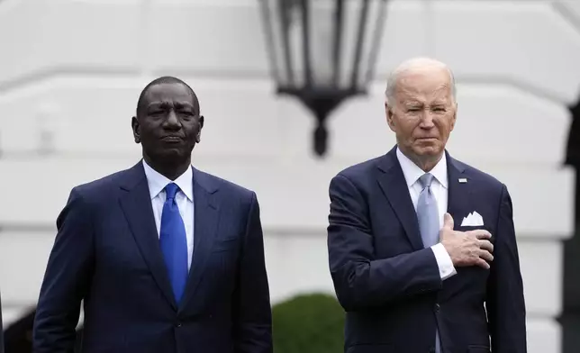 President Joe Biden and Kenya's President William Ruto stand for the U.S. National Anthem during a State Arrival Ceremony on the South Lawn of the White House in Washington, Thursday, May 23, 2024. (AP Photo/Susan Walsh)