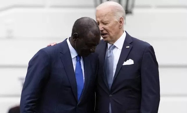 President Joe Biden and Kenya's President William Ruto speak during a State Arrival Ceremony on the South Lawn of the White House in Washington, Thursday, May 23, 2024. (AP Photo/Susan Walsh)