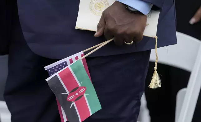 Guests arrive before President Joe Biden and first lady Jill Biden welcome Kenya's President William Ruto and first lady Rachel Ruto at a State Arrival Ceremony on the South Lawn of the White House, Thursday, May 23, 2024, in Washington. (AP Photo/Jacquelyn Martin)