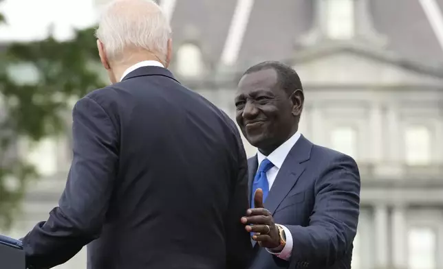 Kenya's President William Ruto, right, and President Joe Biden attend a State Arrival Ceremony Thursday, May 23, 2024, on the South Lawn of the White House in Washington. (AP Photo/Jacquelyn Martin)