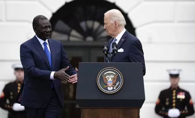 President Joe Biden and Kenya's President William Ruto shake hands during a State Arrival Ceremony on the South Lawn of the White House in Washington, Thursday, May 23, 2024. (AP Photo/Susan Walsh)