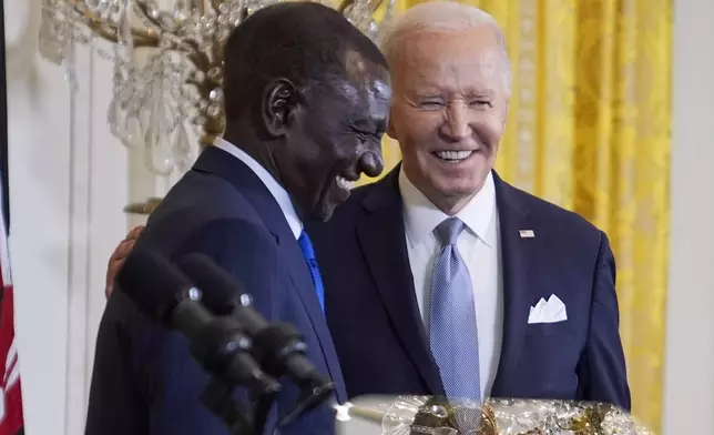 President Joe Biden shakes hands with Kenya's President William Ruto at the end of a news conference in the East Room of the White House, Thursday, May 23, 2024, in Washington. (AP Photo/Evan Vucci)