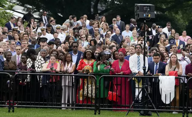 Guests arrive before President Joe Biden and first lady Jill Biden welcome Kenya's President William Ruto and first lady Rachel Ruto at a State Arrival Ceremony on the South Lawn of the White House, Thursday, May 23, 2024, in Washington. (AP Photo/Jacquelyn Martin)