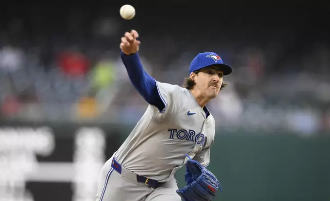 Toronto Blue Jays starting pitcher Kevin Gausman throws during the first inning of a baseball game against the Washington Nationals, Saturday, May 4, 2024, in Washington. (AP Photo/Nick Wass)