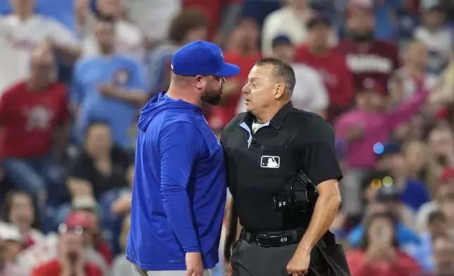 Toronto Blue Jays manager John Schneider argues with home plate umpire Andy Fletcher during the fourth inning of a baseball game against the Philadelphia Phillies, Tuesday, May 7, 2024, in Philadelphia. (AP Photo/Matt Slocum)