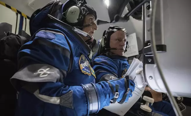 Boeing Crew Flight Test crew members Suni Williams and Butch Wilmore work in the Boeing Starliner simulator at the Johnson Space Center in Houston on Nov. 3, 2022. The first flight of Boeing’s Starliner capsule with a crew on board is scheduled for Monday, May 6, 2024. (NASA/Robert Markowitz)