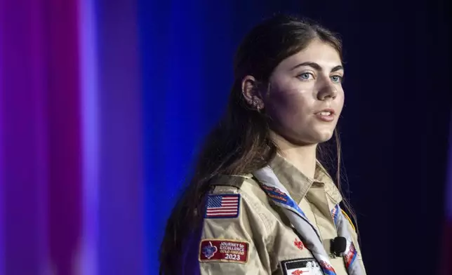 Selby Chipman, 20-year-old, speaks at the Boys Scouts of America annual meeting in Orlando, Fla., Tuesday, May 7, 2024. Chipman, a student at the University of Missouri, is an Inaugural Female Eagle Scout and the Assistant Scoutmaster for an all girls troop 8219 in Oak Ridge, N.C. The Boy Scouts of America is changing its name for the first time in its 114-year history and will become Scouting America. (AP Photo/Kevin Kolczynski)