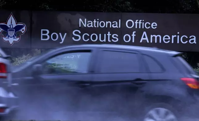 FILE - Cars drive past the Boys Scouts of America headquarters in Irving, Texas, Feb. 12, 2020. The U.S. organization, which now welcomes girls into the program and allows them to work toward the coveted Eagle Scout rank, announced Tuesday, May 7, 2024, that it will change its name to Scouting America as it focuses on inclusion. (AP Photo/LM Otero, File)