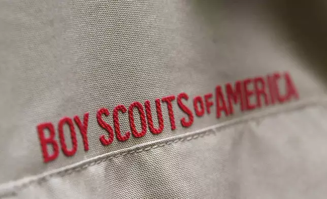 FILE - A Boy Scout uniform is displayed, Feb. 18, 2020, in the retail store at the headquarters for the French Creek Council of the Boy Scouts of America in Summit Township, Erie County, Pa. The U.S. organization, which now welcomes girls into the program and allows them to work toward the coveted Eagle Scout rank, announced Tuesday, May 7, 2024, that it will change its name to Scouting America as it focuses on inclusion. (Christopher Millette/Erie Times-News via AP, File)