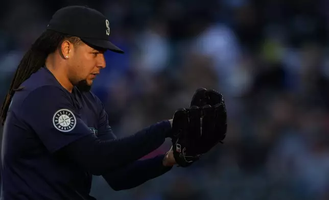 Seattle Mariners starting pitcher Luis Castillo prepares to throw against the Atlanta Braves during the fourth inning of a baseball game Tuesday, April 30, 2024, in Seattle. (AP Photo/Lindsey Wasson)
