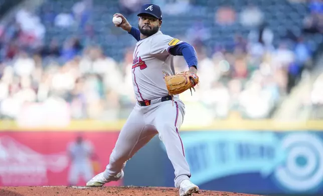 Atlanta Braves starting pitcher Reynaldo López throws against the Seattle Mariners during the second inning of a baseball game Tuesday, April 30, 2024, in Seattle. (AP Photo/Lindsey Wasson)
