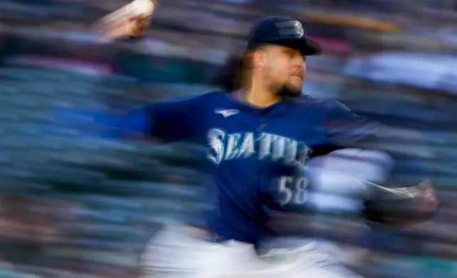 Seattle Mariners starting pitcher Luis Castillo throws against the Atlanta Braves during the fourth inning of a baseball game Tuesday, April 30, 2024, in Seattle. (AP Photo/Lindsey Wasson)
