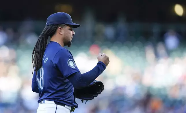 Seattle Mariners starting pitcher Luis Castillo reacts after retiring the side against the Atlanta Braves during the third inning of a baseball game Tuesday, April 30, 2024, in Seattle. (AP Photo/Lindsey Wasson)