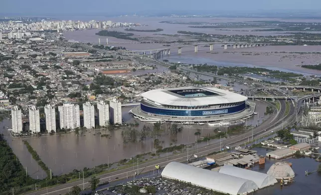 The Gremio Arena and surrounding area are flooded after heavy rain in Porto Alegre, Rio Grande do Sul state, Brazil, Wednesday, May 8, 2024. (AP Photo/Andre Penner)