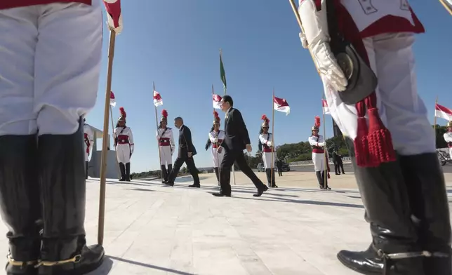 Japan's Prime Minister Fumio Kishida arrives to Planalto presidential palace for a meeting with Brazilian President Luiz Inacio Lula Da Silva in Brasilia, Brazil, Friday, May 3, 2024. (AP Photo/Luis Nova)