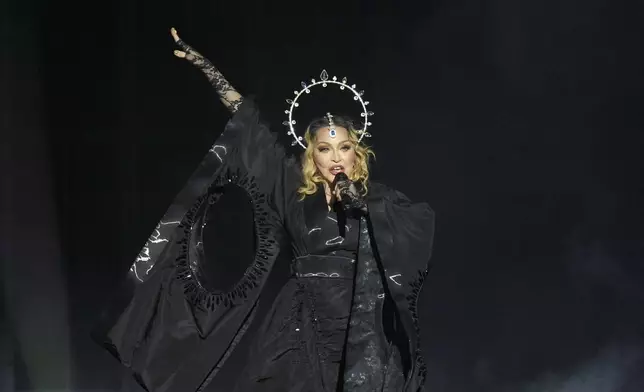 Madonna performs in the final show of her The Celebration Tour, on Copacabana Beach in Rio de Janeiro, Brazil, Saturday, May 4, 2024. (AP Photo/Silvia Izquierdo)