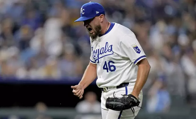 Kansas City Royals relief pitcher Jordan Lyles celebrates after pitching during the ninth inning of a baseball game against the Milwaukee Brewers Tuesday, May 7, 2024, in Kansas City, Mo. The Brewers won 6-5. (AP Photo/Charlie Riedel)