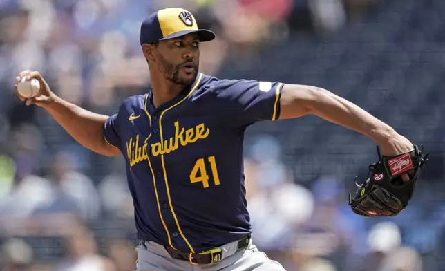 Milwaukee Brewers starting pitcher Joe Ross throws during the first inning of a baseball game against the Kansas City Royals Wednesday, May 8, 2024, in Kansas City, Mo. (AP Photo/Charlie Riedel)