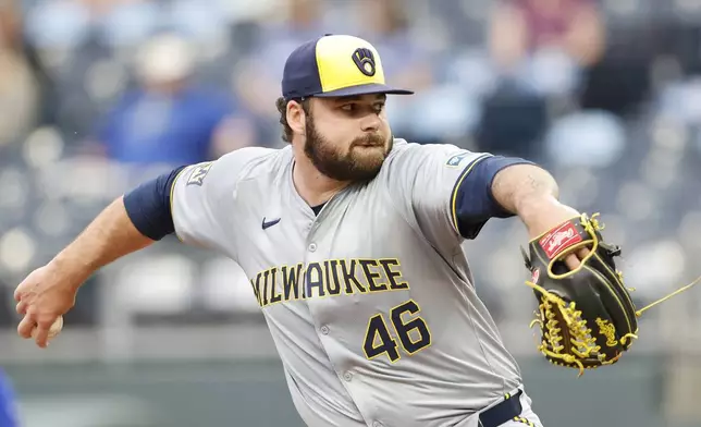 Milwaukee Brewers pitcher Bryse Wilson delivers to a Kansas City Royals batter during the first inning of a baseball game in Kansas City, Mo., Monday, May 6, 2024. (AP Photo/Colin E. Braley)