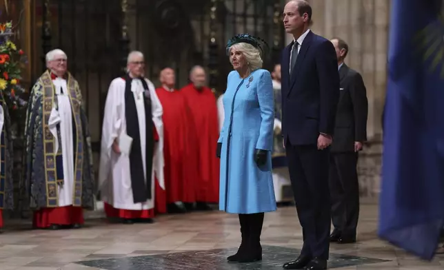 FILE - Britain's Queen Camilla and Prince William, the Prince of Wales attend the annual Commonwealth Day Service of Celebration at Westminster Abbey, in London, Monday, March 11, 2024. Camilla has emerged as one of the monarchy’s most prominent emissaries. Increasing her schedule of appearances, the queen played a crucial role in keeping the royal family in the public eye. (Geoff Pugh/Pool Photo via AP, File)