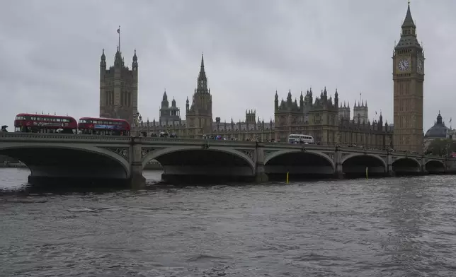 A general view of the Houses of Parliament from across the River Thames in London, Friday, May 3, 2024. Britain's governing Conservative Party is suffering heavy losses as local election results pour in Friday, piling pressure on Prime Minister Rishi Sunak ahead of a U.K. general election in which the main opposition Labour Party appears increasingly likely to return to power after 14 years. (AP Photo/Kin Cheung)