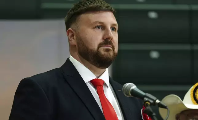 Labour candidate Chris Webb celebrates after winning the Blackpool South by-election following the count at Blackpool Sports Centre in Blackpool, Britain, Friday, May 3, 2024. (Peter Byrne/PA via AP)