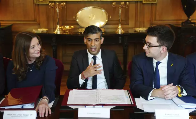 Britain's Prime Minister Rishi Sunak, center, with Education Secretary Gillian Keegan, left, and Edward Isaacs, President of the Union of Jewish Students attend a meeting with universities leaders and representatives from the Union of Jewish Students in Downing Street, London, England, Thursday May 9, 2024. Pro-Palestinian protesters have begun building encampments at universities around the U.K. over the past two weeks as students and academics call on the institutions to cut ties with Israel over its offensive in the Gaza Strip. (Carl Court/Pool via AP)
