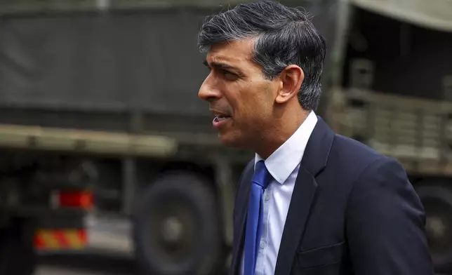 Britain's Prime Minister Rishi Sunak speaks as he takes part in broadcasting a clip during his visit to the Helles Barracks at the Catterick Garrison, a military base in North Yorkshire, Britain, Friday, May 3, 2024. (Molly Darlington/Pool photo via AP)