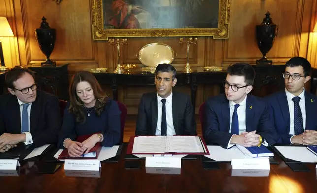 Britain's Prime Minister Rishi Sunak, center, and Education Secretary Gillian Keegan, center left, hold a meeting with universities leaders and representatives from the Union of Jewish Students in Downing Street, London, England, Thursday May 9, 2024. Pro-Palestinian protesters have begun building encampments at universities around the U.K. over the past two weeks as students and academics call on the institutions to cut ties with Israel over its offensive in the Gaza Strip. (Carl Court/Pool via AP)