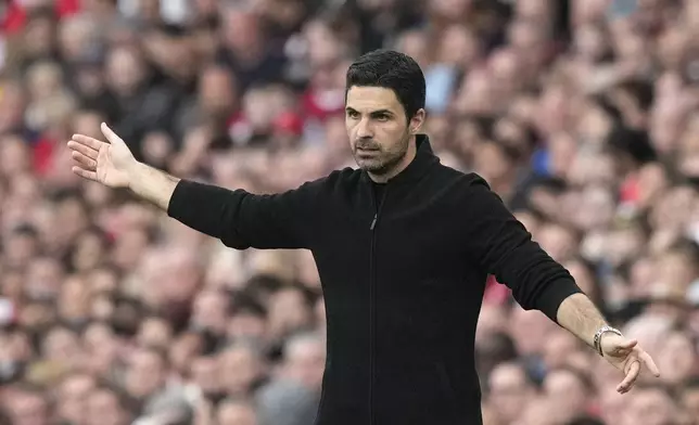 Arsenal's manager Mikel Arteta reacts during the English Premier League soccer match between Arsenal and Bournemouth at Emirates Stadium in London, England, Saturday, May 4, 2024. (AP Photo/Frank Augstein)