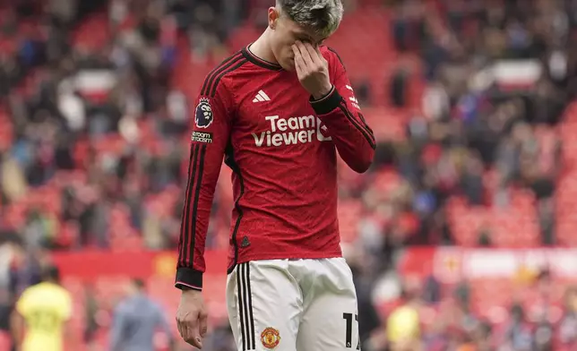 Manchester United's Alejandro Garnacho reacts after the English Premier League soccer match between Manchester United and Burnley at Old Trafford, Manchester, England, Saturday, April 27, 2024. (Martin Rickett/PA via AP)