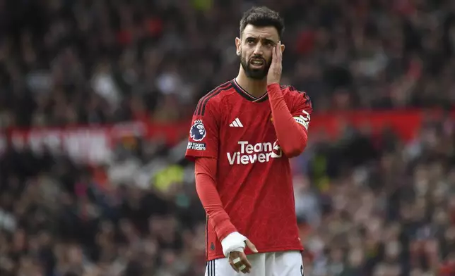 Manchester United's Bruno Fernandes reacts during the English Premier League soccer match between Manchester United and Burnley at Old Trafford stadium in Manchester, England, Saturday, April 27, 2024. (AP Photo/Rui Vieira)