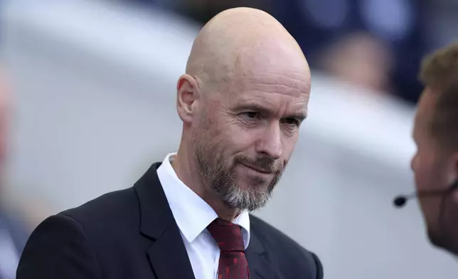 Manchester United manager Erik ten Hag smiles, ahead of the English Premier League soccer match between Brighton &amp; Hove Albion and Manchester United, at the Amex Stadium, in Brighton and Hove, England, Sunday, May 19, 2024. (Steven Paston/PA via AP)
