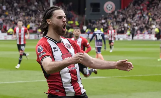 Sheffield United's Ben Brereton Diaz celebrates scoring the first goal of the game, during the English Premier League soccer match between Sheffield United and Nottingham Forest, at Bramall Lane, in Sheffield, England, Saturday May 4, 2024. (Danny Lawson/PA via AP)