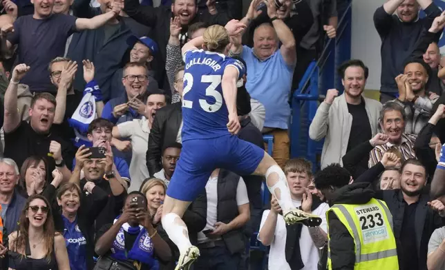 Chelsea's Conor Gallagher celebrates after scoring his side's second goal during the English Premier League soccer match between Chelsea and West Ham United at Stamford Bridge stadium in London, England, Sunday, May 5, 2024. (AP Photo/Frank Augstein)