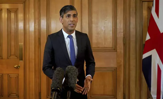 British Prime Minister Rishi Sunak issues a statement after British and US forces struck Houthi targets in Yemen, at 10 Downing Street, London, Friday May 31, 2024. The U.S. and Britain struck 13 Houthi targets in several locations in Yemen on Thursday in response to a recent surge in attacks by the Iran-backed militia group on ships in the Red Sea and Gulf of Aden over the Israel-Hamas war. (Yui Mok/Pool Photo via AP)