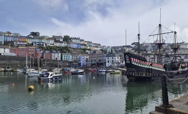 A general view of Brixham Harbour, in Brixham, Devon, Friday May 17, 2024. Around 16,000 homes and businesses in the Brixham area of Devon were told to boil water after cryptosporidium, a microscopic parasite that causes diarrhea, was found in the water. At least 46 cases of cryptosporidiosis have been confirmed and more than 100 other people have reported similar symptoms, the U.K. Health Security Agency said. Cases can last more than two weeks. (Piers Mucklejohn/PA via AP)