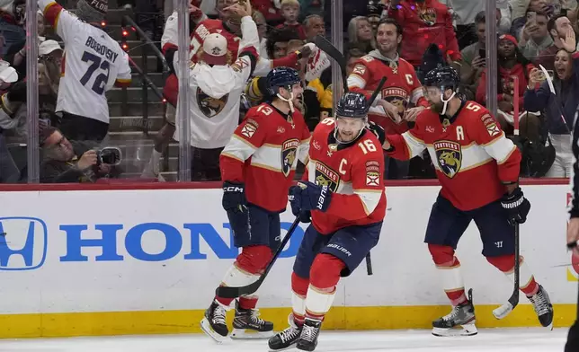Florida Panthers center Aleksander Barkov (16) celebrates after scoring a goal against the Boston Bruins during the second period of Game 2 of a second-round series of the NHL hockey Stanley Cup playoffs Wednesday, May 8, 2024, in Sunrise, Fla. (AP Photo/Lynne Sladky)