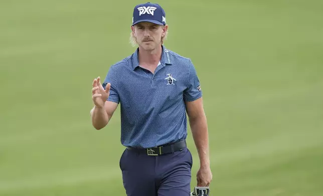 Jake Knapp waves on the 18th hole during the second round of the Byron Nelson golf tournament in McKinney, Texas, Friday, May 3, 2024. (AP Photo/LM Otero)