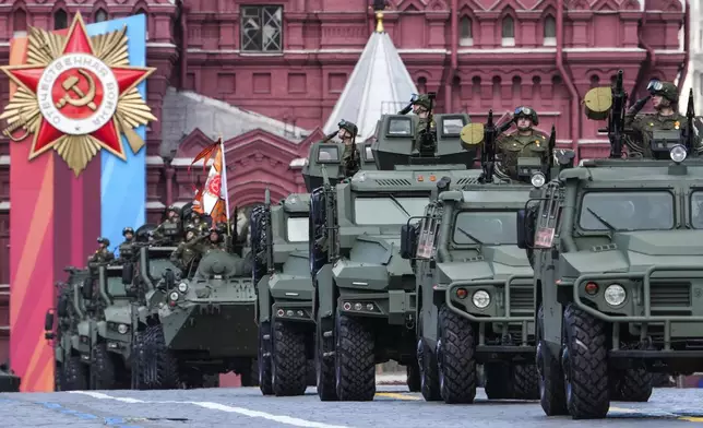 CORRECTS DATE Russian armoured military vehicles roll during the Victory Day military parade dress rehearsal at the Red Square in Moscow, Russia, Sunday, May 5, 2024. The parade will take place at Moscow's Red Square on May 9 to celebrate 79 years since the victory in WWII. (AP Photo/Alexander Zemlianichenko)