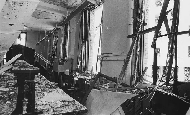 FILE - In this August, 1970, file photo debris scattered inside the Army Merthamatics Research Center in Sterling Hall following a bombing at the University of Wisconsin in Madison. Forty years after after the Aug. 24, 1970 explosion that killed one, injured others and caused millions in damage, Leo Burt remains the last fugitive wanted by the FBI in connection with radical anti-Vietnam War protest activities. (Bruce Fritz/The Capital Times/Wisconsin State Journal via AP, File)