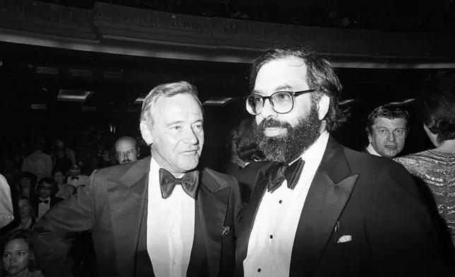 FILE - Directors Volker Schlondorff, left, and Francis Ford Coppola, winners of the Palm D'Or prize, are shown at the awards ceremony at Cannes International Film Festival on May 25, 1979. Schlondorff directed "The Tin Drum," and Coppola directed "Apocalypse Now." (AP Photo, File)