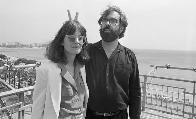 FILE - Film director Francis Ford Coppola appears with his wife Ellie at the Cannes Film Festival on May 19, 1979. Coppola is back at Cannes with his latest film "Megalopolis." (AP Photo, File)