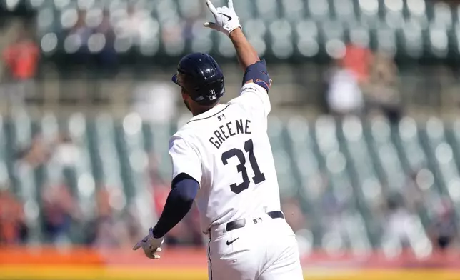 Detroit Tigers designated hitter Riley Greene rounds the bases after a solo home run during the fourth inning in the first game of a baseball doubleheader against the St. Louis Cardinals, Tuesday, April 30, 2024, in Detroit. (AP Photo/Carlos Osorio)