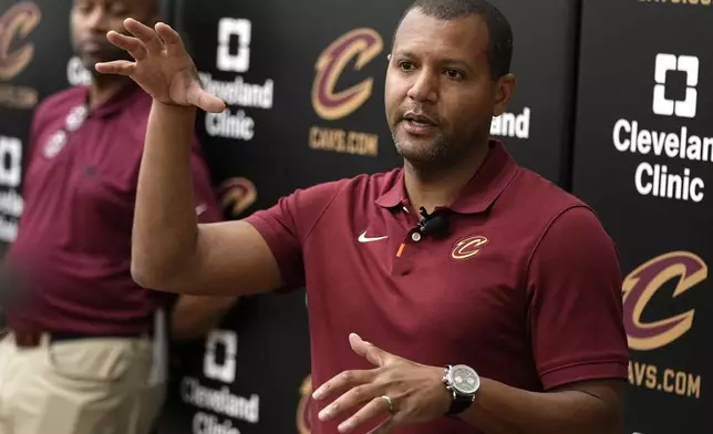 Koby Altman, president of basketball operations for the Cleveland Cavaliers, answers a question at a news conference in Brecksville, Ohio, Friday, May 24, 2024. (AP Photo/Sue Ogrocki)